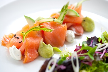 Close up of smoked salmon salad with green asparagusの写真素材