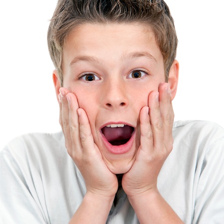 Close up portrait of boy with surprising face expression Isolated on white の写真素材