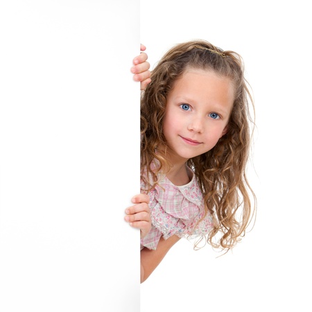 Close up Portrait of little girl holding copy space  Isolated on white background の写真素材