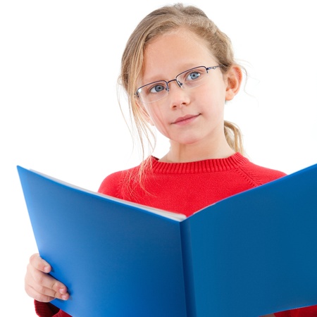 Portrait of cute blond girl studying with blue notebook  Isolated on white の写真素材