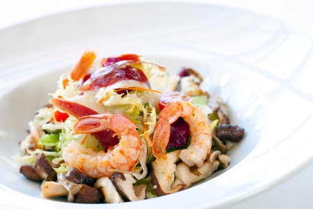 Close up shrimp salad with mushrooms and lettuce.の写真素材