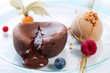 Close up of hot melting chocolate cake dessert. の写真素材