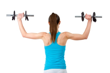 Rear view of woman lifting weights.Isolated on white backgroundの写真素材