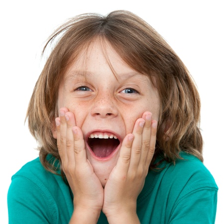 Close up portrait of boy with surprising face expression.Isolated on white.の写真素材