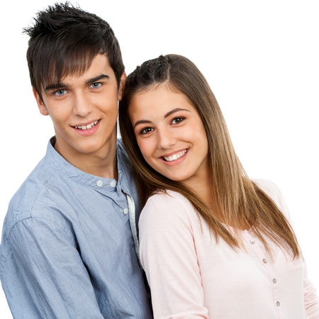 Close up portrait of cute teen couple.Isolated on white background.の写真素材