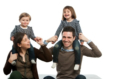 portrait of happy family playing around on couch.Isolated.の写真素材