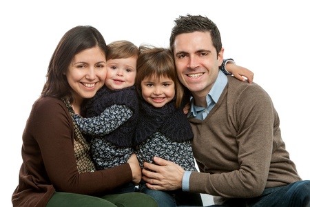 Close up portrait of happy family with heads together.Isolated on white.の写真素材