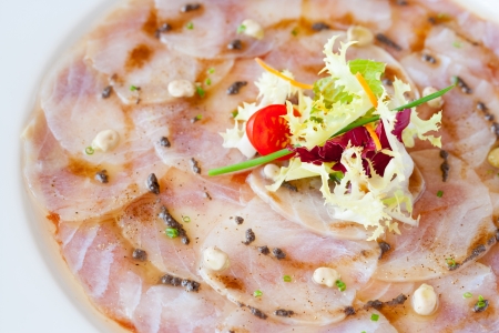 Extreme close up of cod fish carpaccio. の写真素材