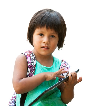 Portrait of cute native american girl holding tablet.Isolated on white.の写真素材