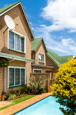 Detail of two story town house with private swimming pool.の写真素材