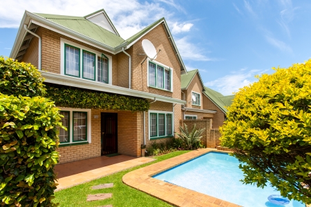 Two story family home with private swimming pool.の写真素材