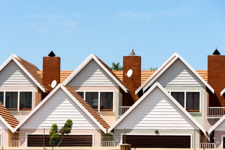 Close up detail of modern town houses with electric fencing.の写真素材