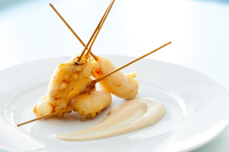Close up detail of deep fried shrimp tempura.の写真素材