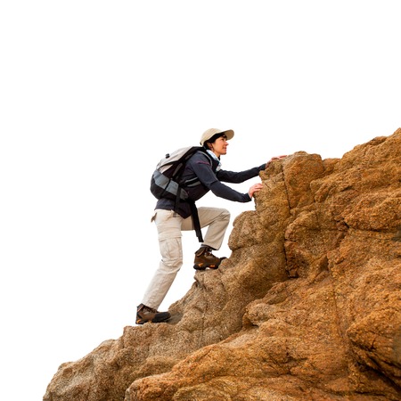 Close up of female hiker climbing on rocks.Isolated on white background.の写真素材