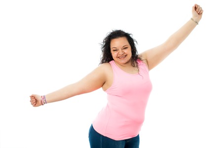 Portrait of obese girl with open arms.の写真素材