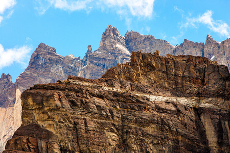 Close up Detail of extreme rocky mountain tops against blue sky.の写真素材