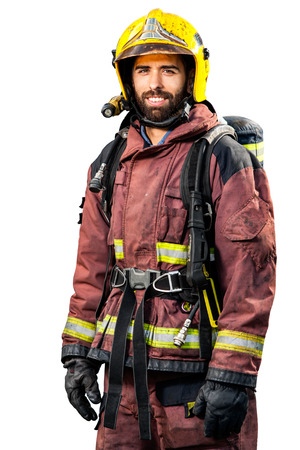 Fireman in fire fighting gear isolated on white background.の写真素材