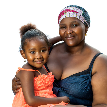Close up portrait of african woman with her little girl sitting on lap.Isolated on white background.の写真素材