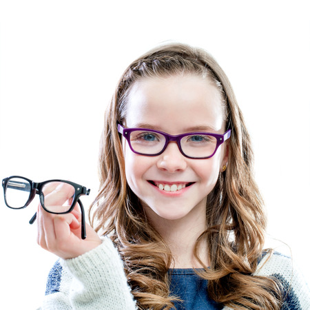 Girl holding glasses in hand.Isolated on white background.の写真素材