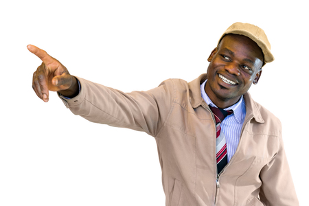 Close up portrait of handsome friendly  african businessman pointing with finger at corner.Isolated on white background.の写真素材