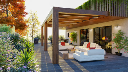 3d illustration of luxury private patio with teak wood pergola. Sundeck with decor sofas and a set table surrounded by a flower garden.の写真素材