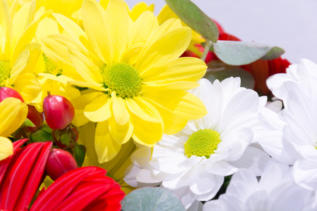 A large bouquet of love. Bouquet of gerberas and daisies. Bridal bouquet. Bundle of flowers in a vase. Fresh scent of spring flowers.の写真素材