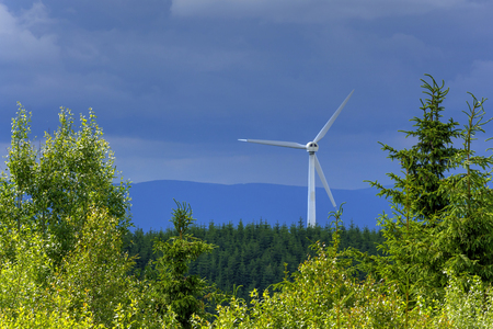 View of wind power plants in the mountains. Ecological electricity in the Czech Republic.