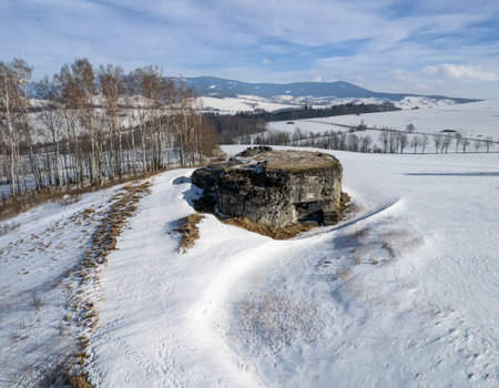 Winter landscape with a concrete blockhouse in the foreground. Kralicky Sneznik, Czechia.の写真素材