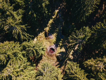 Drone view of ruins of abandoned bunker in the forest. Eagle Mountains, Czech Republic.の写真素材