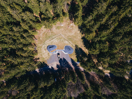 Drone view of ruins of abandoned artillery bunker in the forest. Eagle Mountains, Czech Republic.の写真素材