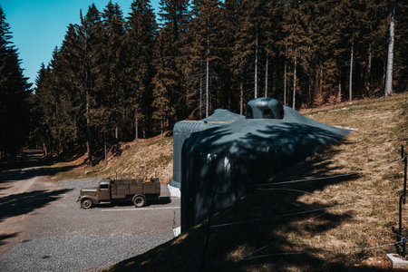 Detail of former military bunker with truck in forest. Eagle Mountains, Czech Republic.のeditorial素材