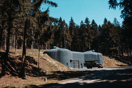 Spring day, bunker with path and truck in forest. Eagle Mountains, Czechia.のeditorial素材