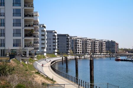 Modern residential complex next to river Mainの写真素材