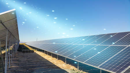 solar panels installed on the ground, sunlight falls on it, environmentally friendly renewable energy, cheap and modern way to generate electricityの写真素材