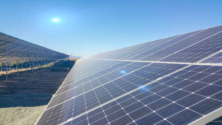 solar panels installed on the ground, sunlight falls on it, environmentally friendly renewable...