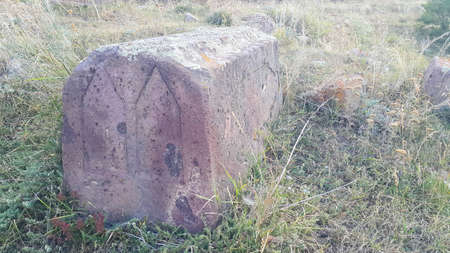Ancient Armenian cemetery. Christian Grave of 1800 Burial place. Carved tombstone. Very old threaded stones. Memorial to the memory of the old world. Historical memory.の写真素材