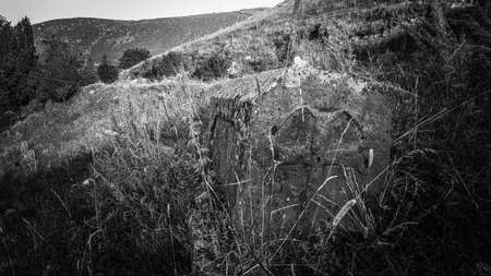 Ancient Armenian cemetery. Christian Grave of 1800 Burial place. Carved tombstone. Very old threaded stones. Memorial to the memory of the old world. Historical memory.の写真素材