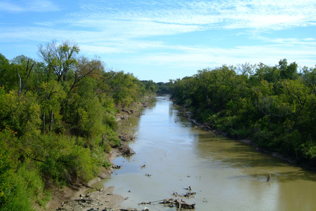 Flowing river between Leveesの写真素材