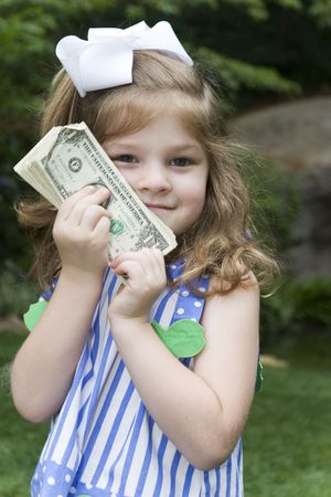 Expressive girl with a bunch of money