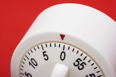 close-up of egg timer running out of time