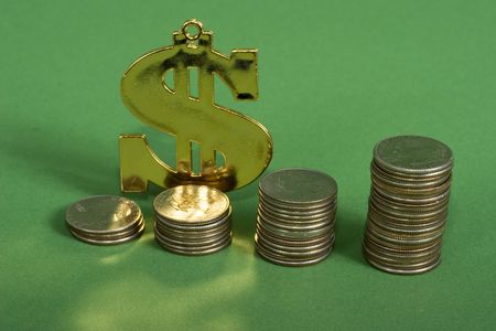 A dollar sign with a row on coins