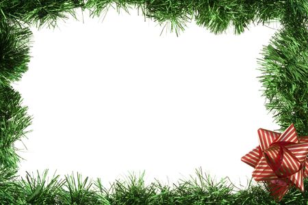 Green garland frame with bow isolaed over whiteの写真素材