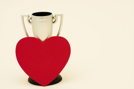 Trophy with red heart for your messageの写真素材