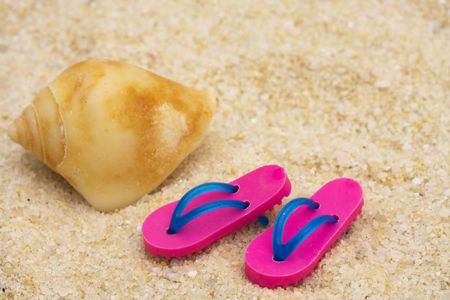 Flip flops on sand  summer time funの写真素材