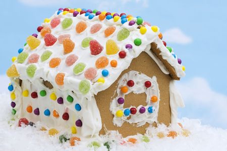 Gumdrops on gingerbread house in a winter sceneの写真素材