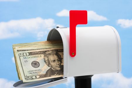 White mailbox filled with twenty dollar bills and a blue sky and cloud background, mailboxの写真素材