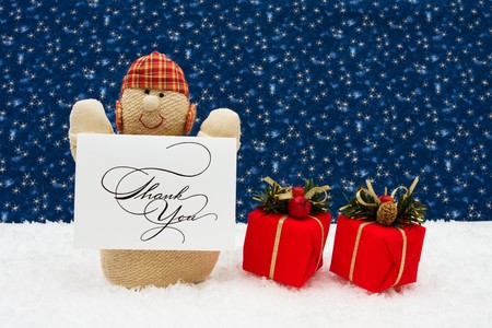 Snowman with thank you card and presents on a star background, Snowmanの写真素材