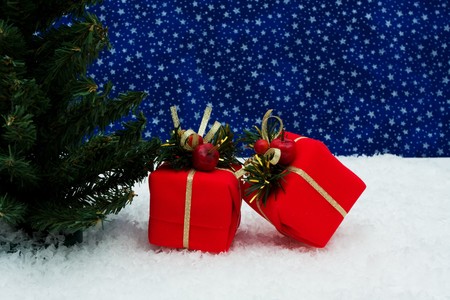 Tree with presents under it on star background, Christmas tree