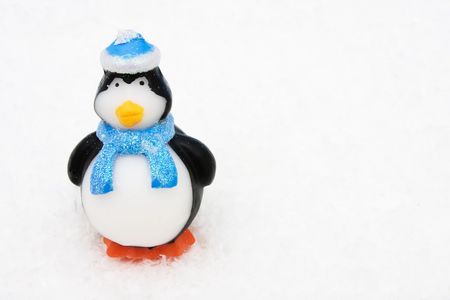 Close up of penguin sitting on snow background, Penguinの写真素材
