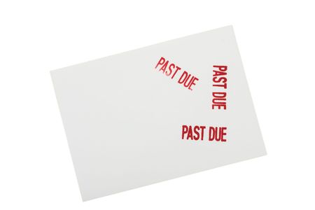 White envelope with past due stamped on it isolated on a white background, past due billsの写真素材